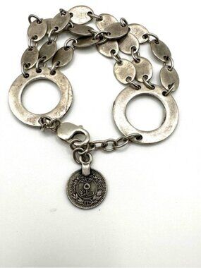 Silver circle dangle link bracelet with a coin charm